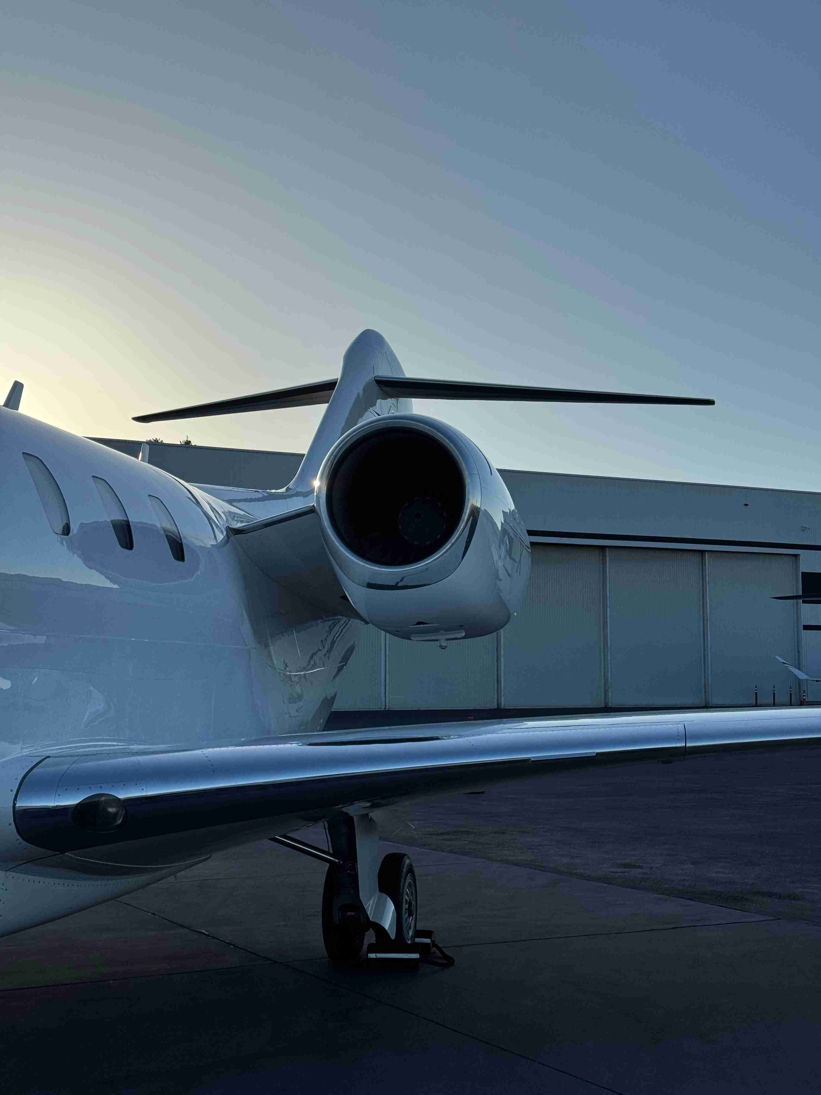 Aircraft parked on tarmac after professional detailing service